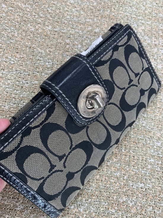 Coach Handbags - Coach Black and Tan Signature Turnlock Wallet